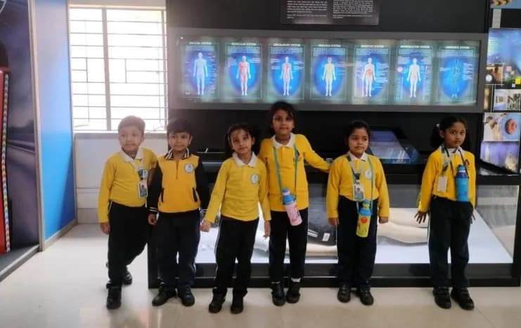Children at an interactive human body exhibit in a science centre